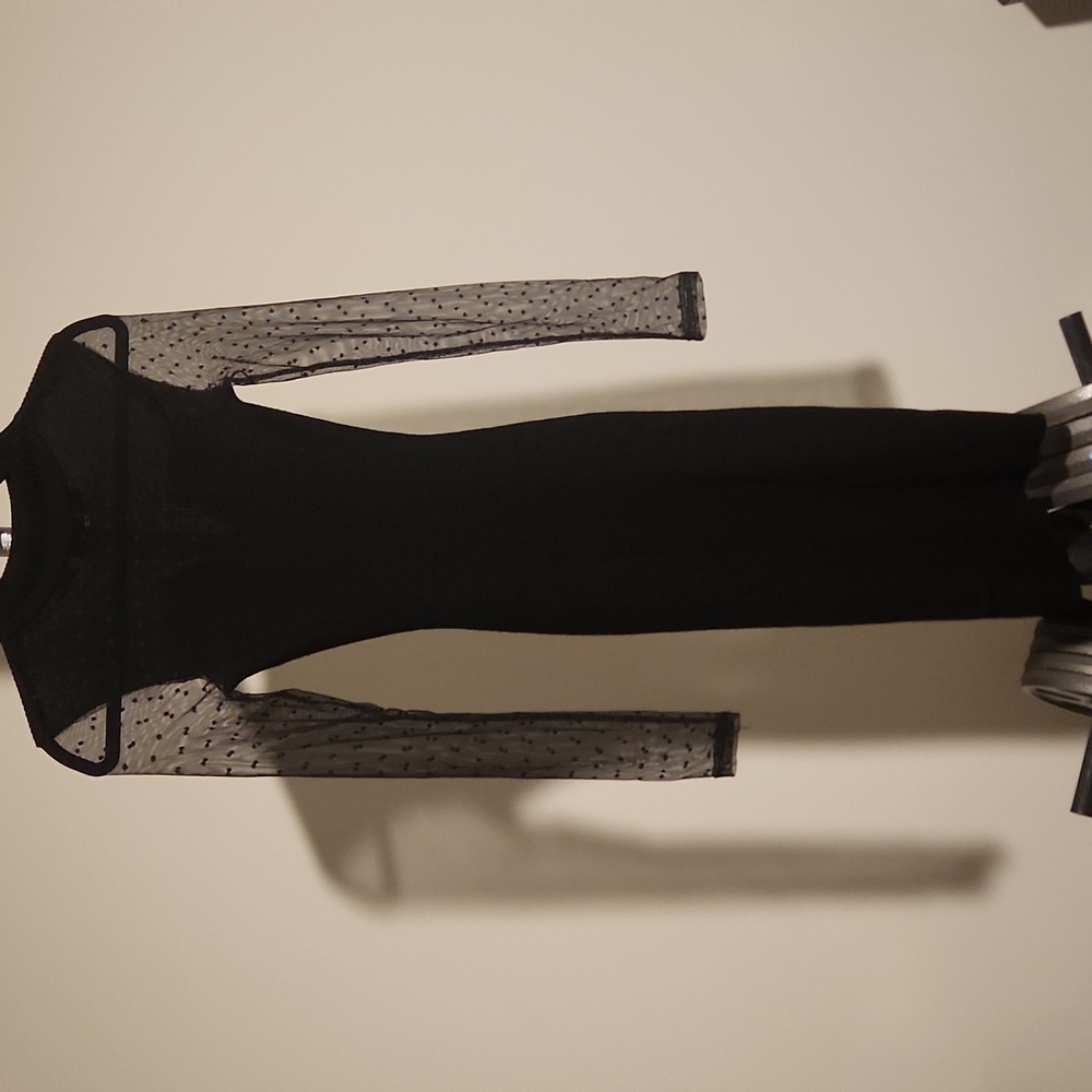 Almost Famous Black Dress with Sheer Polka Dot Sleeves